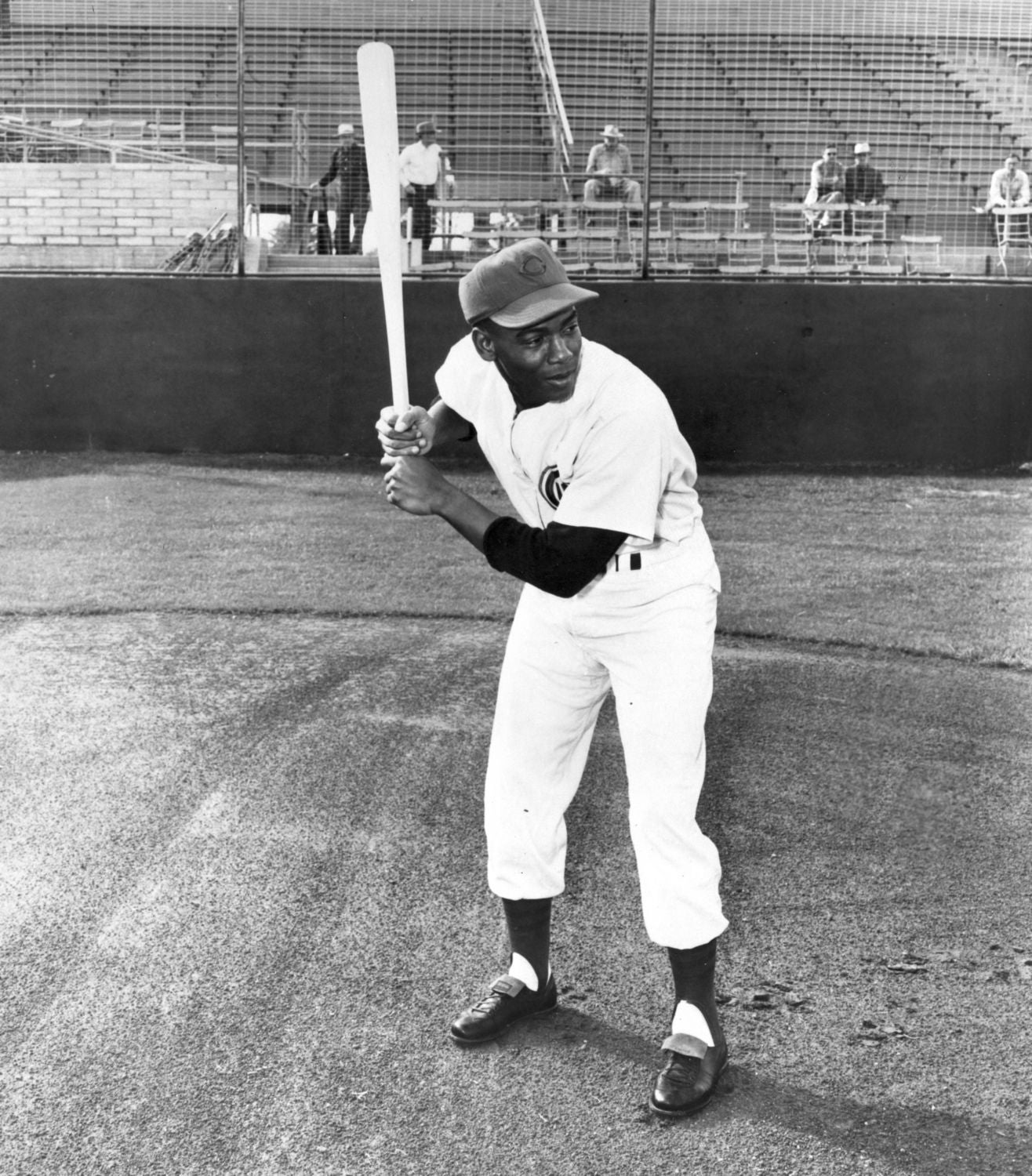 Between shortstop and first base, Banks tried the outfield Baseball